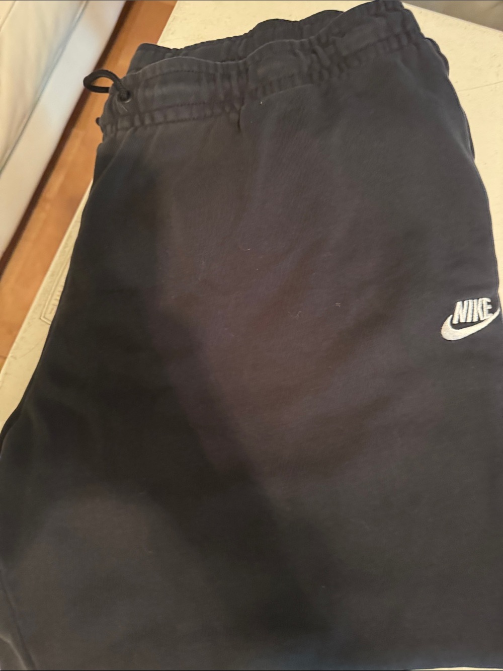 Nike Kids Black Jogger Sweatpants with White Swoosh